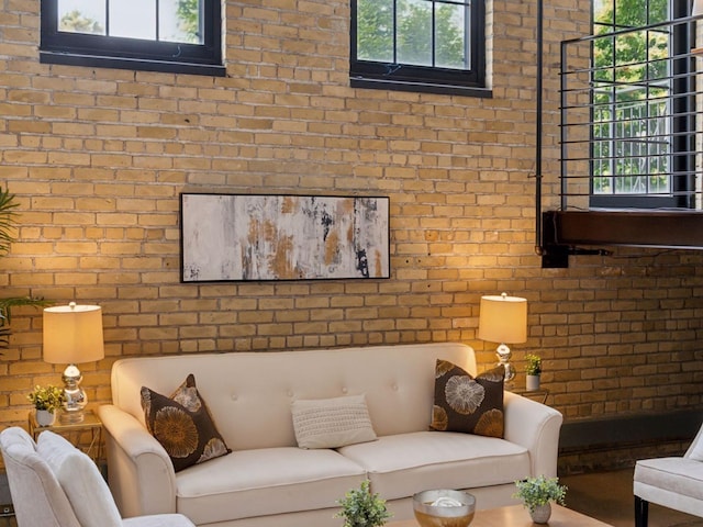 730 Stinson Blvd Unit 106, Minneapolis, MN 55413 - living room featuring brick wall