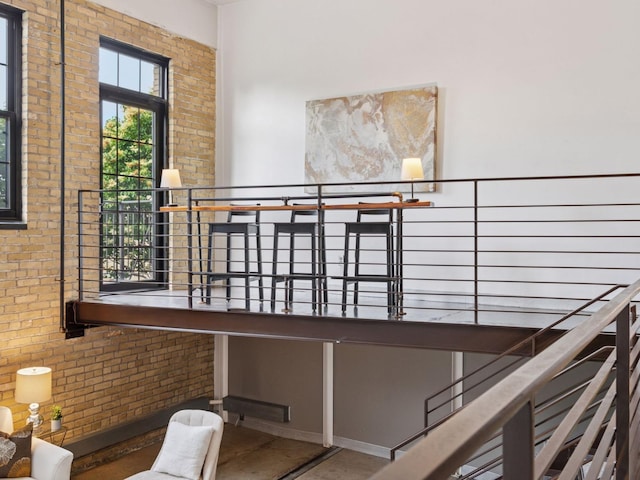 730 Stinson Blvd Unit 106, Minneapolis, MN 55413 - stairway featuring brick wall