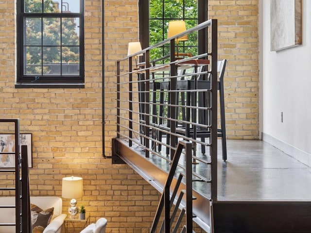 730 Stinson Blvd Unit 106, Minneapolis, MN 55413 - staircase with brick wall