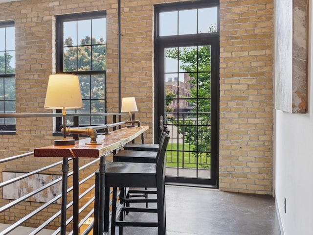 730 Stinson Blvd Unit 106, Minneapolis, MN 55413 - office space with brick wall and concrete flooring