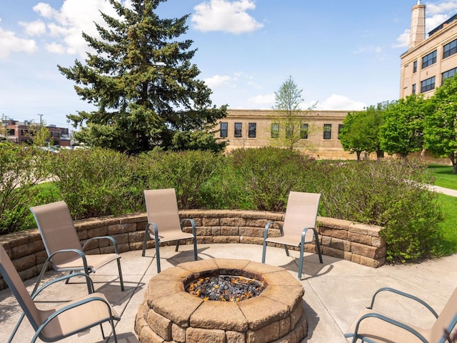 730 Stinson Blvd Unit 106, Minneapolis, MN 55413 - view of patio with an outdoor fire pit