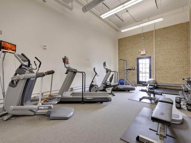 730 Stinson Blvd Unit 106, Minneapolis, MN 55413 - gym with a high ceiling and brick wall