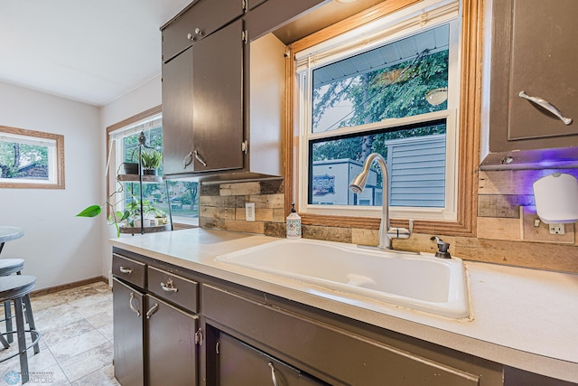 1019 3rd Ave N, Moorhead, MN 56560 - kitchen with light countertops and decorative backsplash