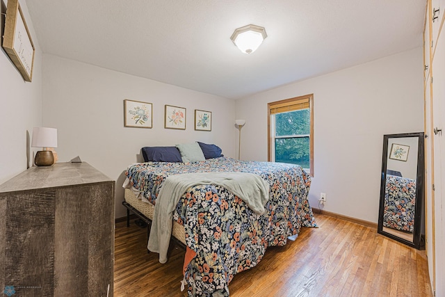 1019 3rd Ave N, Moorhead, MN 56560 - bedroom featuring wood-type flooring and baseboards