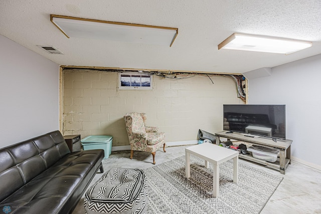 1019 3rd Ave N, Moorhead, MN 56560 - living area with a textured ceiling and concrete block wall