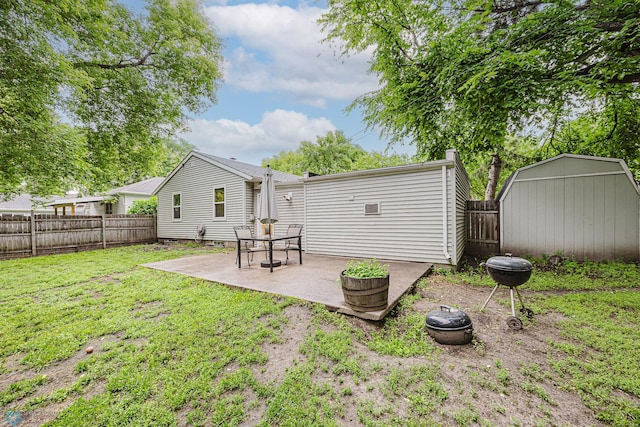 1019 3rd Ave N, Moorhead, MN 56560 - back of house featuring a fenced backyard, a patio, a shed, and a pergola