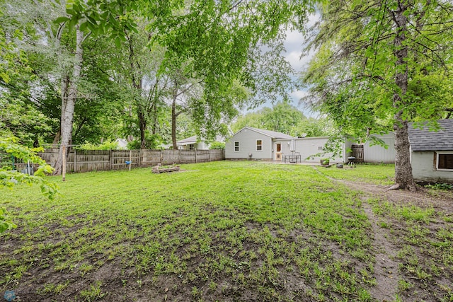 1019 3rd Ave N, Moorhead, MN 56560 - fenced backyard featuring an outdoor structure