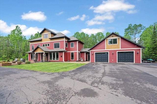 1753 Old N Shore Rd, Duluth Twp, MN 55804 - view of front facade with a front lawn and a garage