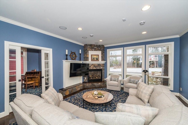 1753 Old N Shore Rd, Duluth Twp, MN 55804 - living room featuring ornamental molding, recessed lighting, and a stone fireplace
