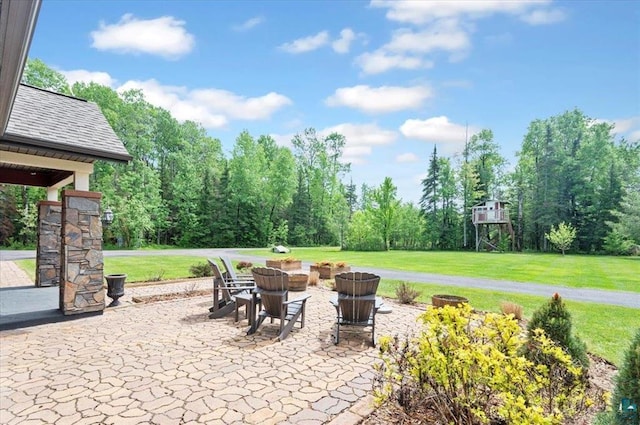 1753 Old N Shore Rd, Duluth Twp, MN 55804 - view of patio with a fire pit
