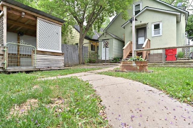 409 3rd St, Bovey, MN 55709 - bungalow-style house featuring stucco siding