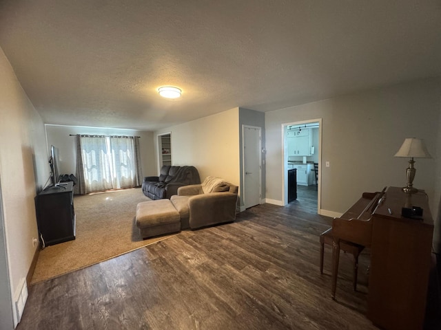 2977 State Highway 68, Marshall, MN 56258 - living area featuring dark wood finished floors and a textured ceiling