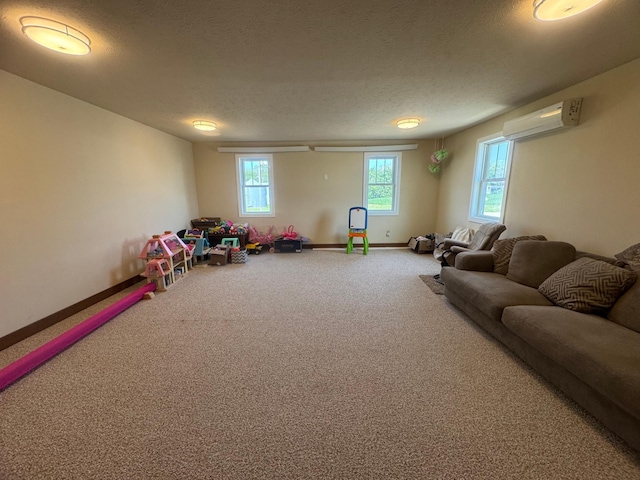 2977 State Highway 68, Marshall, MN 56258 - game room featuring a wall mounted air conditioner, carpet floors, and a textured ceiling