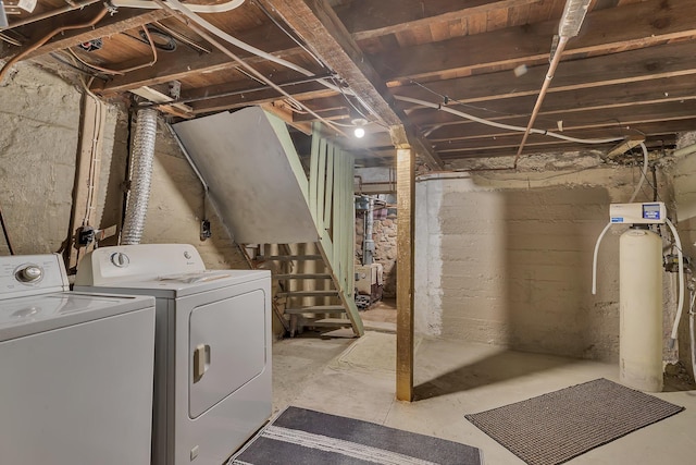 505 Riverside Ave N, Sartell, MN 56377 - unfinished below grade area featuring washer and clothes dryer, a water softener system, and stairs