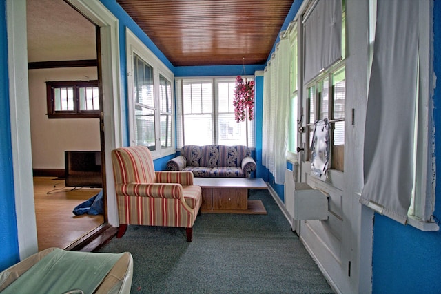 4317 2nd Ave S, Minneapolis, MN 55409 - sunroom / solarium with baseboards and carpet flooring