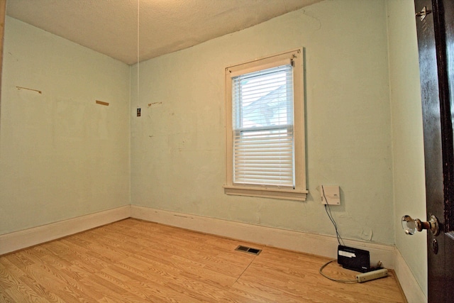 4317 2nd Ave S, Minneapolis, MN 55409 - unfurnished room featuring wood finished floors