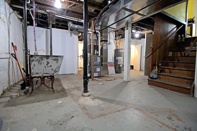 4317 2nd Ave S, Minneapolis, MN 55409 - unfinished basement with gas water heater, stairway, and heating unit