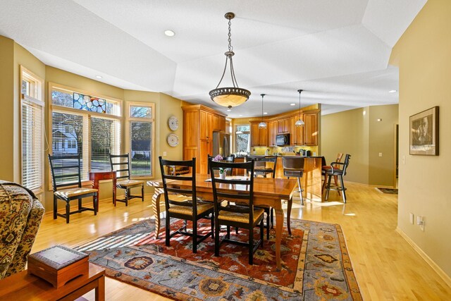 14802 Margaret Pl, Minnetonka, MN 55345 - dining space featuring light wood finished floors and recessed lighting