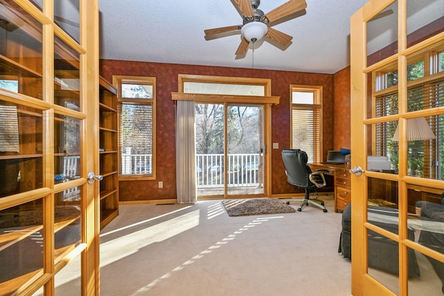 14802 Margaret Pl, Minnetonka, MN 55345 - carpeted office space featuring french doors, ceiling fan, and wallpapered walls