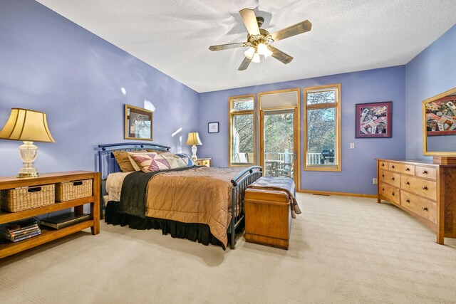 14802 Margaret Pl, Minnetonka, MN 55345 - carpeted bedroom featuring access to exterior, a ceiling fan, and a textured ceiling