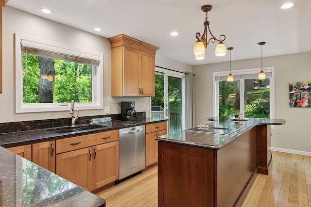 8155 134th St W, Apple Valley, MN 55124 - kitchen with stainless steel dishwasher, light wood-style floors, decorative light fixtures, stovetop with downdraft, and a center island