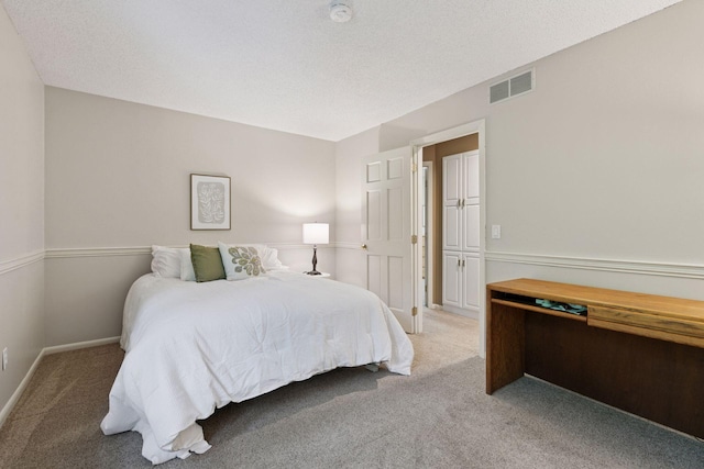 8155 134th St W, Apple Valley, MN 55124 - carpeted bedroom with a textured ceiling