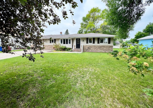 211 5th St NE, Barnesville, MN 56514 - ranch-style home with a front lawn, a chimney, and stone siding