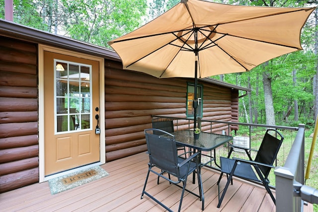 3938 State Road 77, Swiss Twp, WI 54830 - wooden deck featuring outdoor dining area