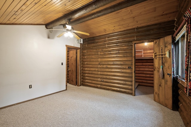 21750 Elk Lake Rd NW, Elk River, MN 55330 - unfurnished bedroom with carpet, rustic walls, wooden ceiling with exposed beams, baseboards, and a closet
