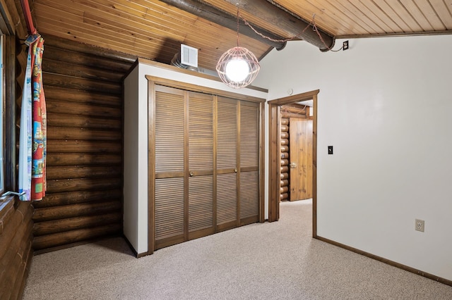 21750 Elk Lake Rd NW, Elk River, MN 55330 - unfurnished bedroom with rustic walls, carpet, wooden ceiling, a closet, and baseboards