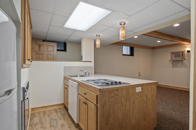 21750 Elk Lake Rd NW, Elk River, MN 55330 - kitchen featuring white appliances, a sink, a peninsula, an AC wall unit, and light countertops