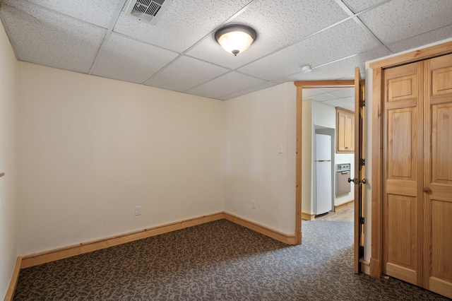 21750 Elk Lake Rd NW, Elk River, MN 55330 - spare room featuring a drop ceiling, carpet, and baseboards