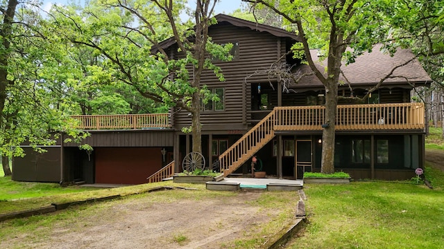21750 Elk Lake Rd NW, Elk River, MN 55330 - back of house with log exterior, stairs, a wooden deck, a lawn, and a patio