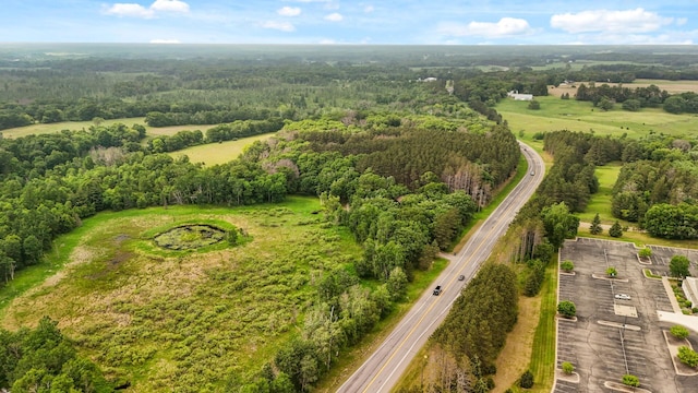 21750 Elk Lake Rd NW, Elk River, MN 55330 - aerial view of property and surrounding area with a heavily wooded area and a highway