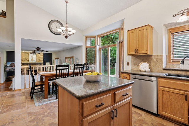 989 Coneflower Ct, Eagan, MN 55123 - kitchen featuring dishwasher, plenty of natural light, dark countertops, decorative backsplash, and high vaulted ceiling