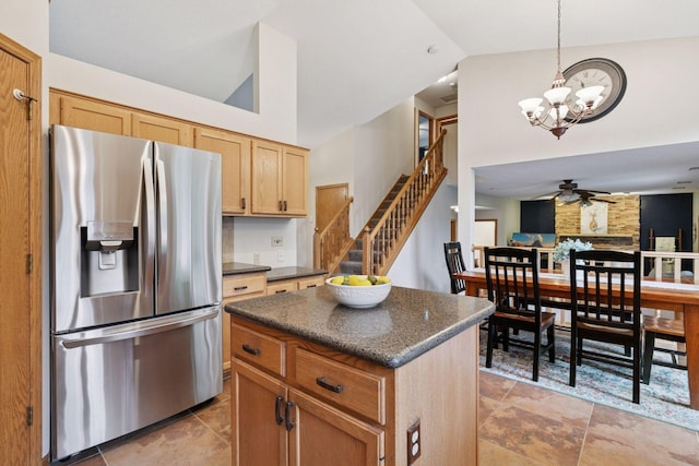 989 Coneflower Ct, Eagan, MN 55123 - kitchen featuring stainless steel fridge with ice dispenser, high vaulted ceiling, a chandelier, a kitchen island, and a ceiling fan
