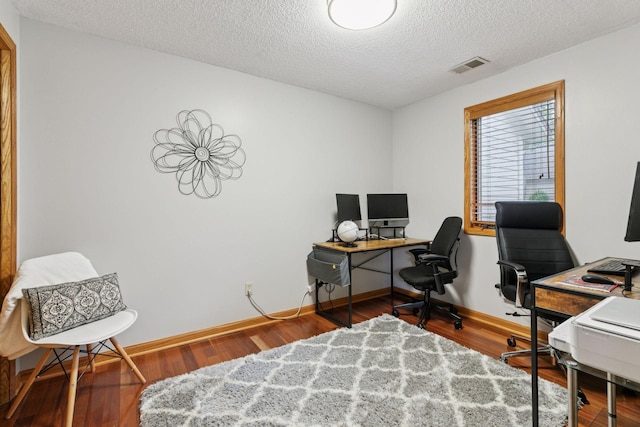 989 Coneflower Ct, Eagan, MN 55123 - home office with a textured ceiling and wood finished floors