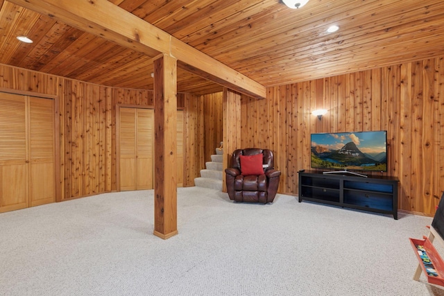 989 Coneflower Ct, Eagan, MN 55123 - carpeted living room with a wood ceiling with exposed beams, stairway, and wooden walls