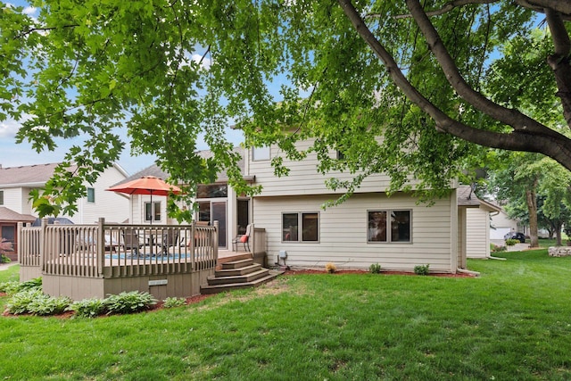 989 Coneflower Ct, Eagan, MN 55123 - back of property featuring a deck and a lawn