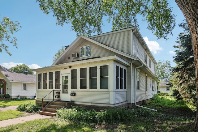 1384 Midway Pkwy, Saint Paul, MN 55108 - view of front of house with a sunroom