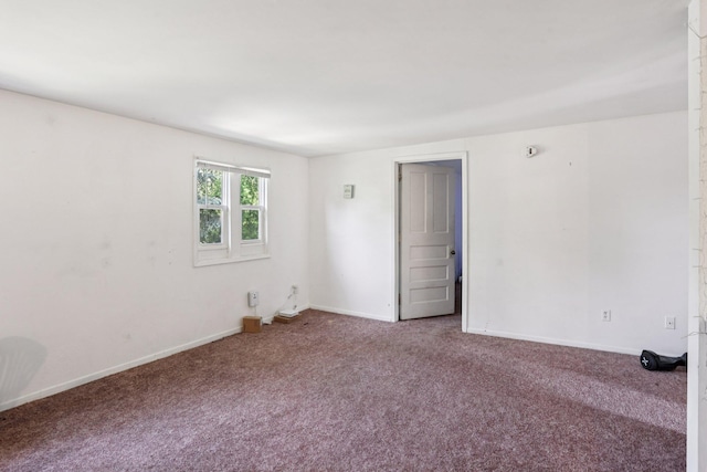 1384 Midway Pkwy, Saint Paul, MN 55108 - carpeted empty room with baseboards