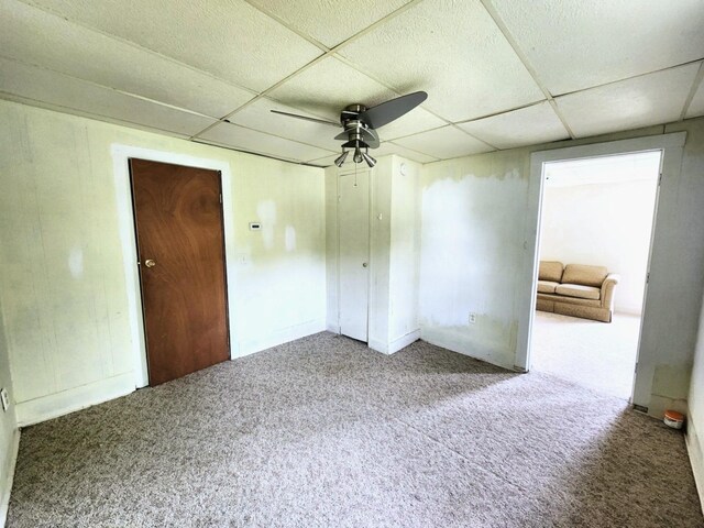 14 4th Ave SE, Dodge Center, MN 55927 - spare room with ceiling fan, carpet, and a drop ceiling