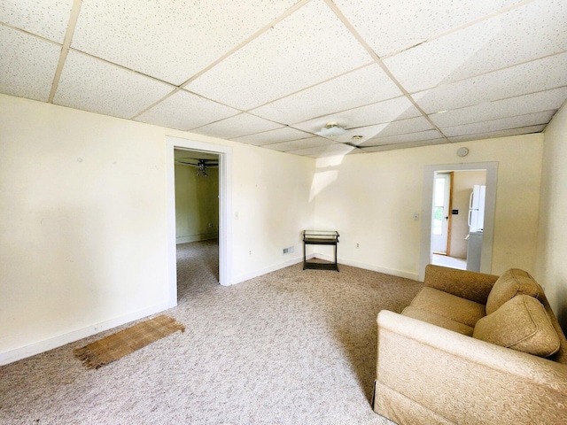 14 4th Ave SE, Dodge Center, MN 55927 - living room with a drop ceiling, baseboards, and carpet floors