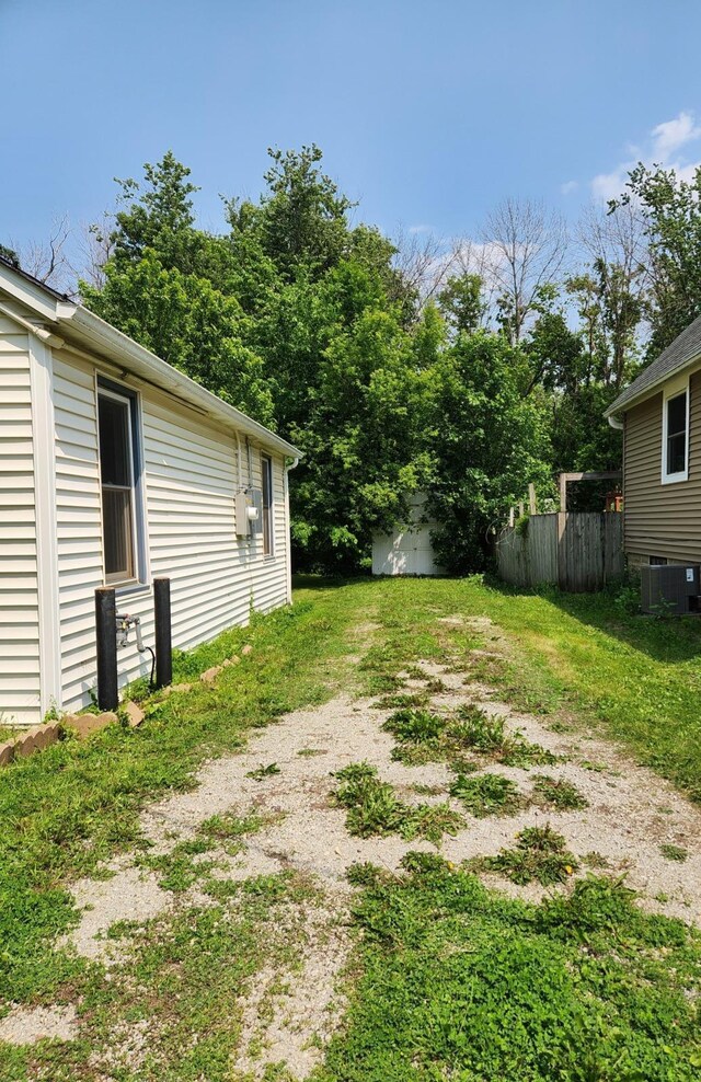 14 4th Ave SE, Dodge Center, MN 55927 - view of yard featuring central air condition unit