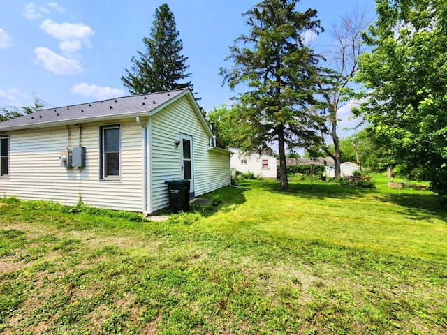 14 4th Ave SE, Dodge Center, MN 55927 - view of property exterior with a yard