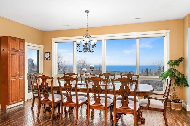 969 Deerview Ln, Two Harbors, MN 55616 - dining space with dark wood-style floors and a chandelier