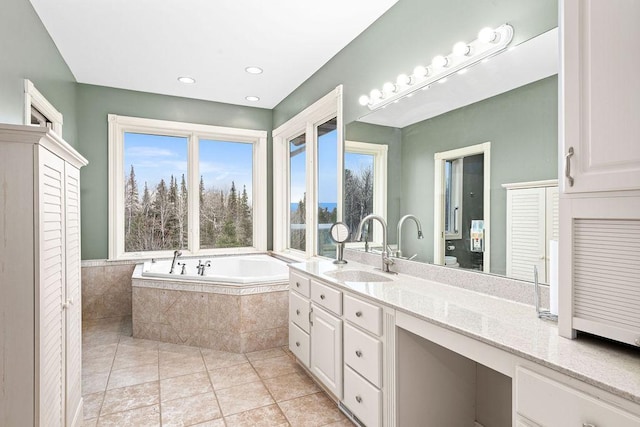 969 Deerview Ln, Two Harbors, MN 55616 - full bathroom featuring a bath, a closet, vanity, and tile patterned flooring