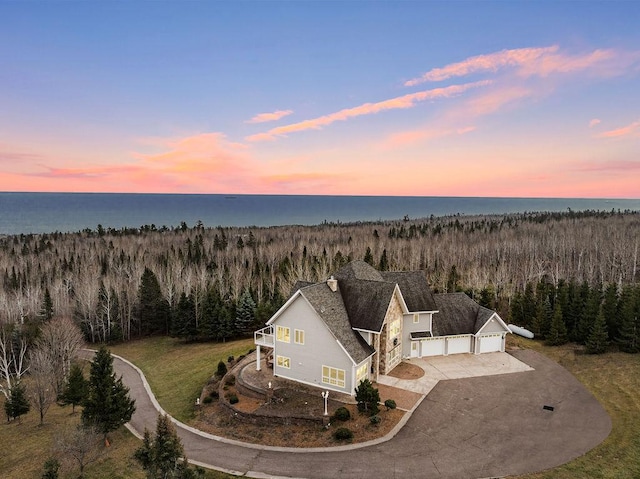 969 Deerview Ln, Two Harbors, MN 55616 - view from above of property featuring a heavily wooded area and a nearby body of water