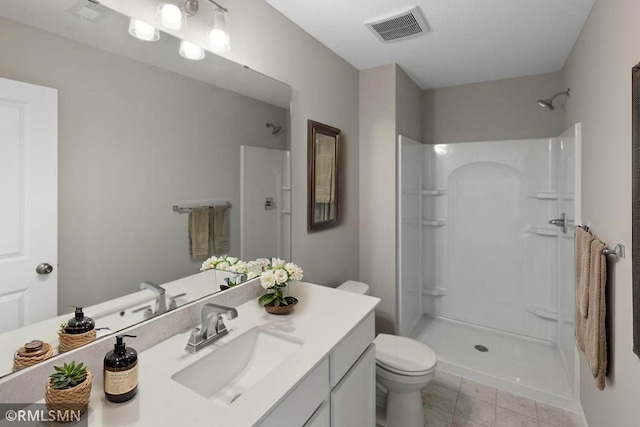 7471 147th Ln NW, Ramsey, MN 55303 - bathroom featuring a shower, vanity, and tile patterned floors