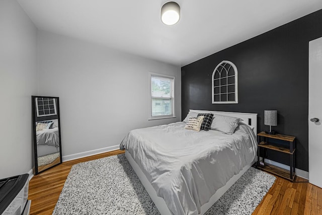1819 4th Ave, Mankato, MN 56001 - bedroom featuring wood finished floors and baseboards